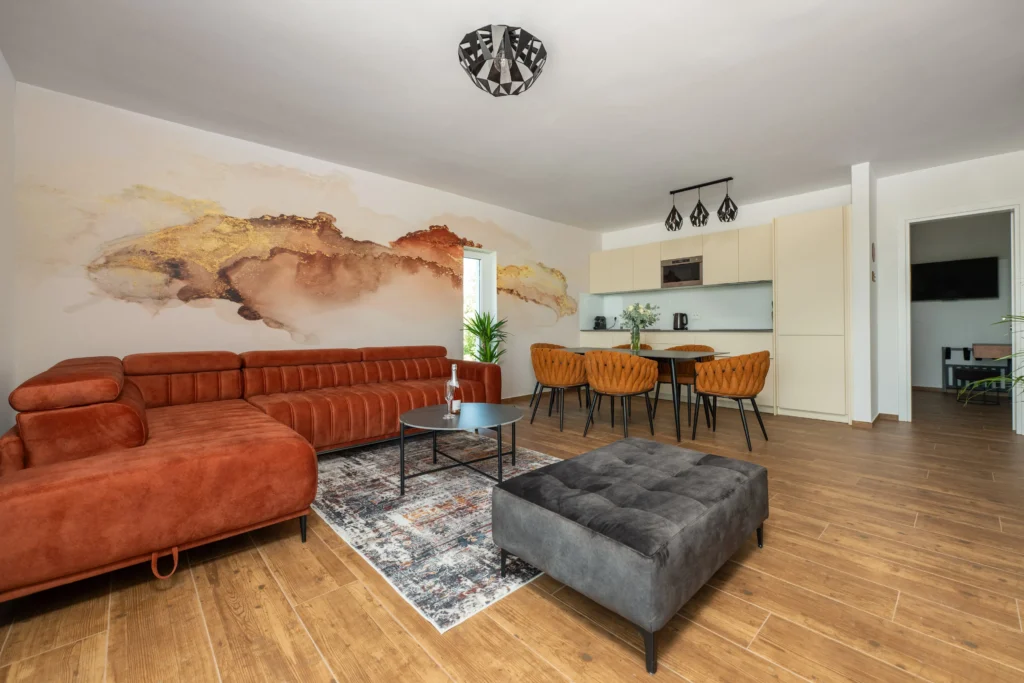 Modern living room with open kitchen in Villa Wood luxury apartment