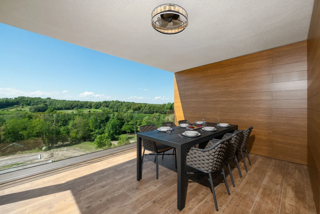Private balcony seating area at Villa Wood luxury apartment