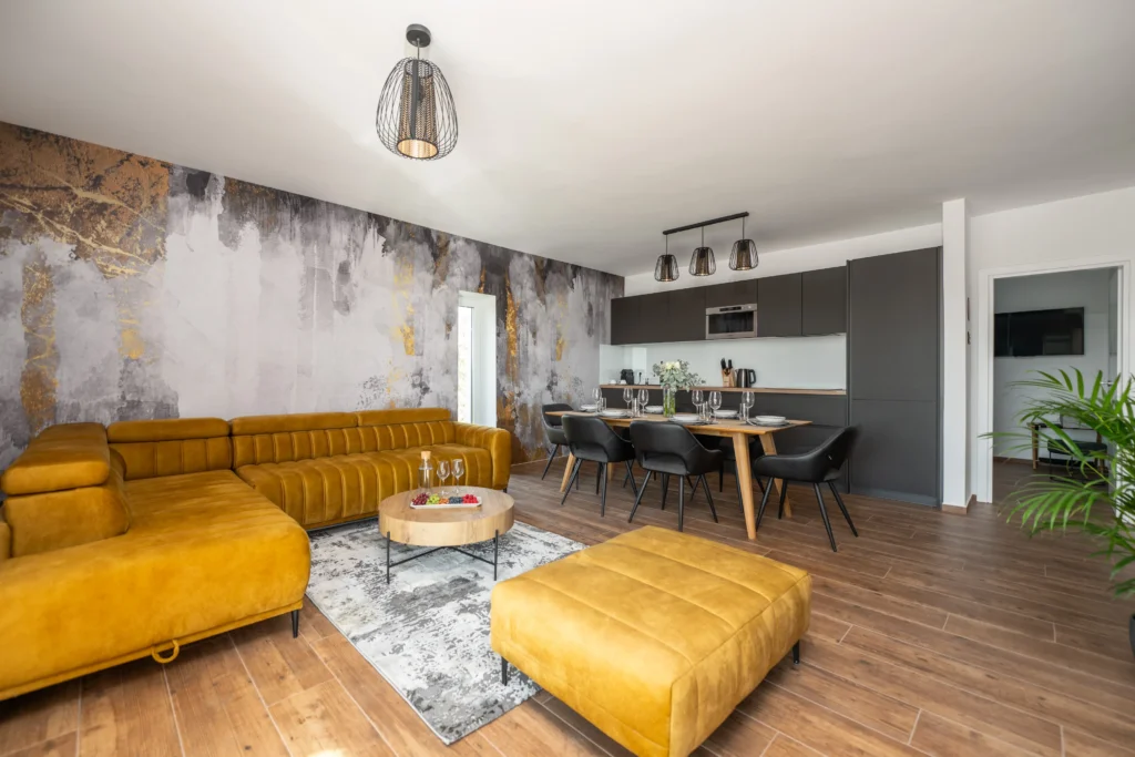 Modern living room with open kitchen in Villa Wood luxury apartment