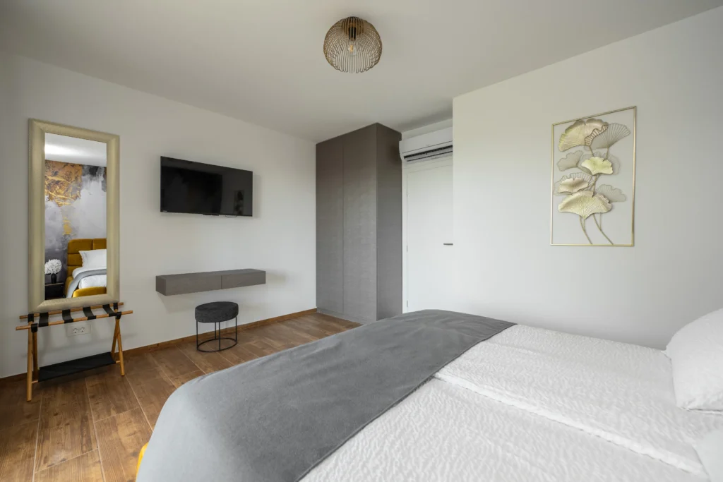 Elegant bedroom with balcony view at Villa Wood near Zagreb