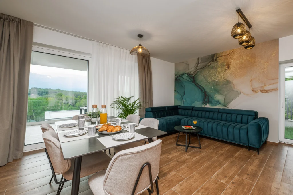 Modern living room with open kitchen in Villa Wood luxury apartment