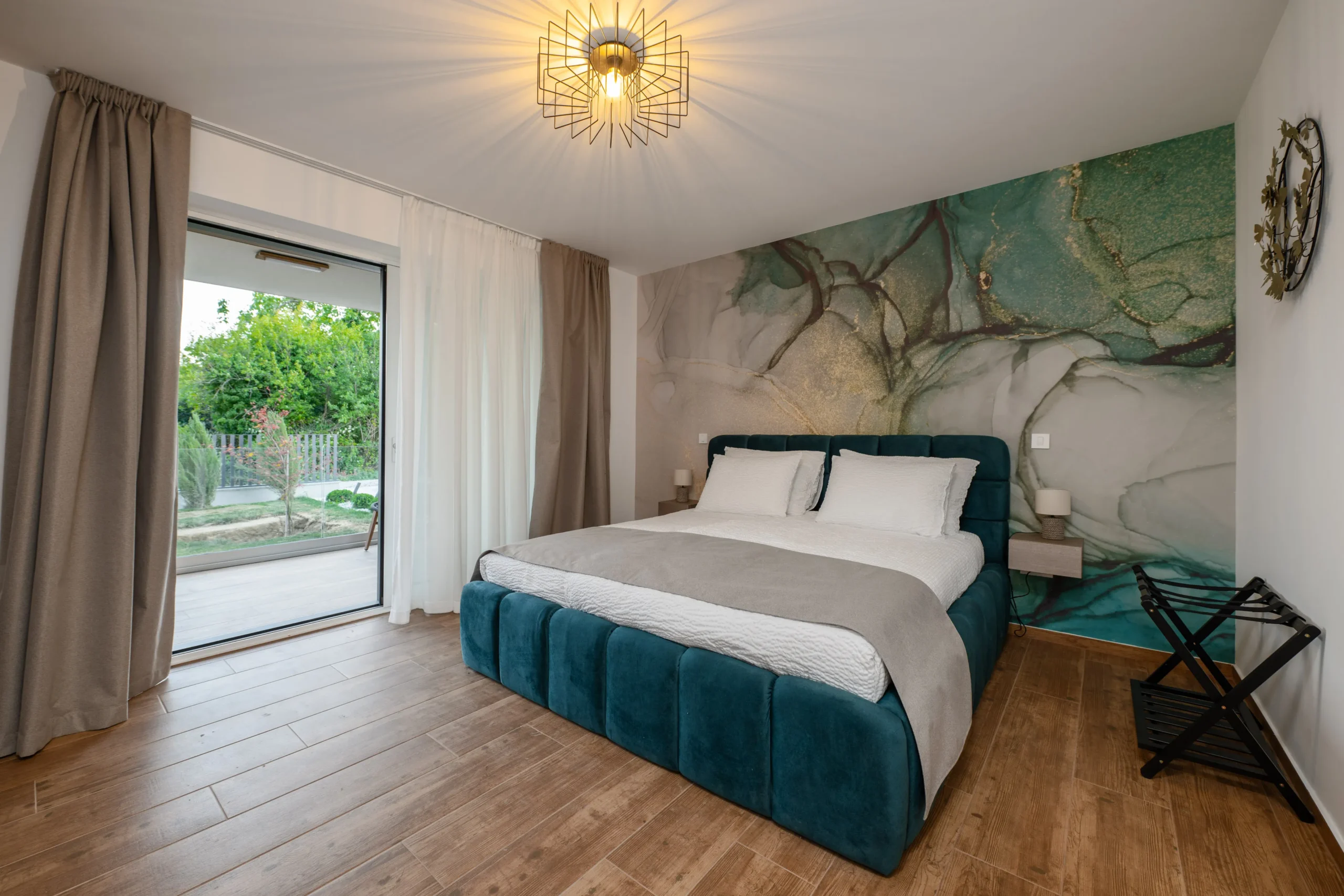 Elegant bedroom with balcony view at Villa Wood near Zagreb