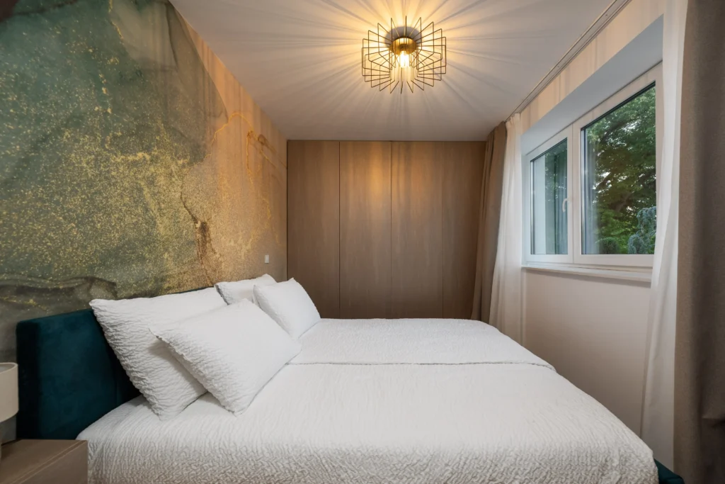 Elegant bedroom with balcony view at Villa Wood near Zagreb