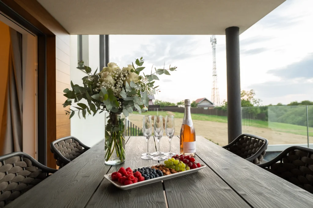 Private balcony seating area at Villa Wood luxury apartment